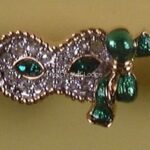 Swarovski_2001_event_pin_mask_Harlequin_green_USA_1_WM Swarovski_2001_event_pin_mask_Harlequin_green_USA | The Crystal Lodge