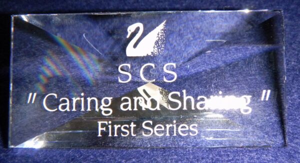 Swarovski_SCS_Caring_and_Sharing_trilogy_plaque | The Crystal Lodge